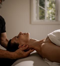Woman getting a neck massage