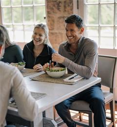 People eating together in a dining hall