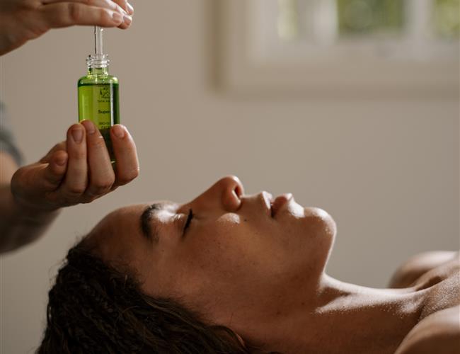 Woman doing facial session
