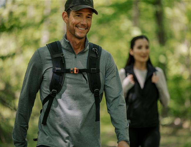 Man hiking with a smile
