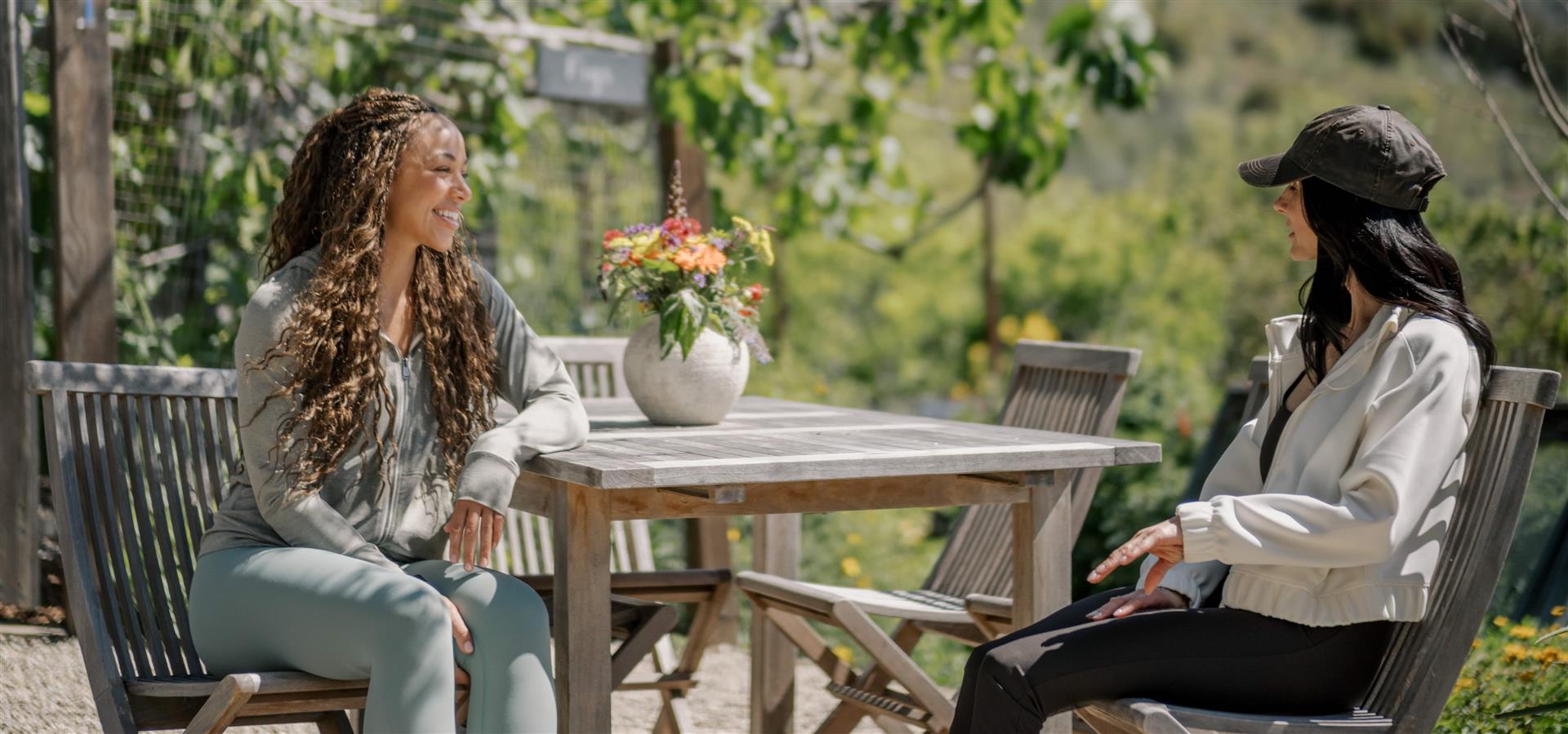 Two girls talking outside 